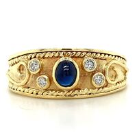  18KT Yellow Gold Oval Blue Sapphire andn Diamond Bezel Set Ring