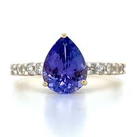  10KT Yellow Gold Pear Tanzanite & Round White CZ Side Stones Ring
