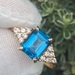 14kt Yellow Gold Emerald Cut Blue Stone Diamond Ring