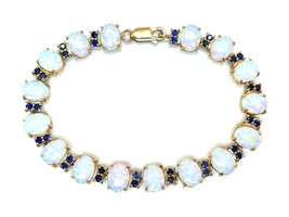  The Epitome Of Beauty: Vintage Opal & Sapphire Bracelet set in 10kt yellow gold