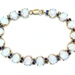  The Epitome Of Beauty: Vintage Opal & Sapphire Bracelet set in 10kt yellow gold