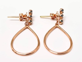 Gems Whisper: 14kt Rose Gold Earrings with Captivating Green Stones