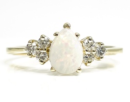 Mesmerizing 14KT Yellow Gold Opal and Diamond Ring