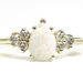  Mesmerizing 14KT Yellow Gold Opal and Diamond Ring