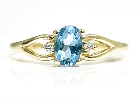 Stylish 14KT Yellow Gold Blue Topaz and Diamond Ring