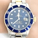 Elevate Your Style: Rolex Submariner Datewatch 16613 Bluesy