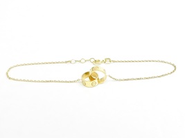  Chic and Classy: 18K Yellow Gold Charm Bracelet 7.5"