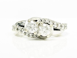 Infinite Beauty: 10K White Gold .95 ctw Diamond and Ruby Ring Size 5.5