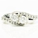 Infinite Beauty: 10K White Gold .95 ctw Diamond and Ruby Ring Size 5.5