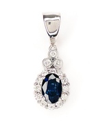  Epitome of Elegance: 18K White Gold .25 ctw Diamond & Sapphire Pendant