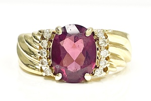  Light and Luxury: 14K Yellow Gold Diamond Ring with Red Center Stone 